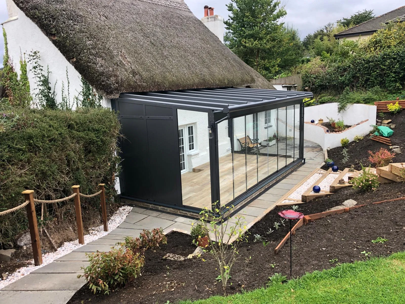 Glazed veranda on a thatched cottage, photo 2 of 2